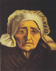 Head of a peasant with white cap by Vincent van Gogh