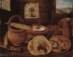 A poor man's meal, a loaf of bread, porridge, buns and a herring on a wooden table by Hieronymous Francken II