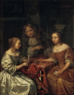 Two Ladies and a Gentleman discussing a Letter by Caspar Netscher