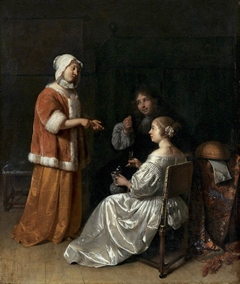 Interior with two young women in conversation and a man showing a coin by Caspar Netscher