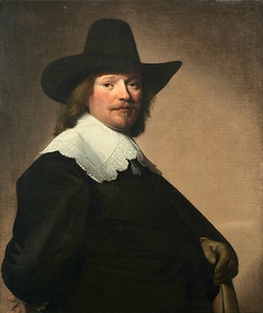 Portrait of a gentleman, three-quarter-length, in black costume with a white lace collar and a black hat by Johannes Cornelisz Verspronck