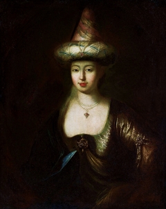 Portrait of a woman in oriental costume. by Antoine Pesne