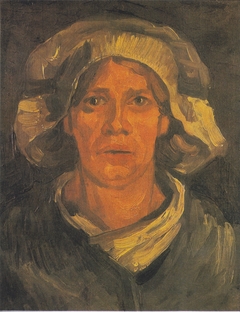 Head of a Peasant woman with white hood by Vincent van Gogh