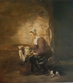 Woman plucking duck by Adriaen Cornelisz Beeldemaker