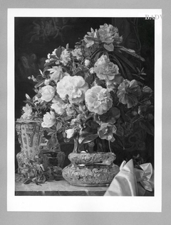 flower-stillife, silver cup and vase on a table by Ferdinand Georg Waldmüller