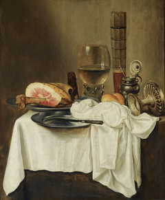 Still life with ham, a wineglass and a tazza on a draped table by Anonymous