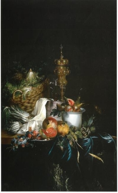 Sumptuous table with fruit and covered beaker by Catharina Treu