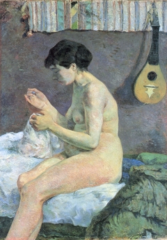 Woman Sewing by Paul Gauguin