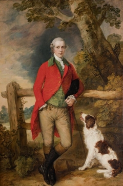 Portrait of Robert Thistlethwayte of Norman Court, standing full-length, wearing a red coat, green waistcoat and buff breaches, holding a can, leaning against a fence, a spaniel by his side by Thomas Gainsborough