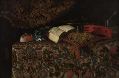 Still life with masks, books and musical instruments by Giuseppe Recco