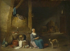 An Old Woman peeling Pears by a follower of David Teniers the Younger