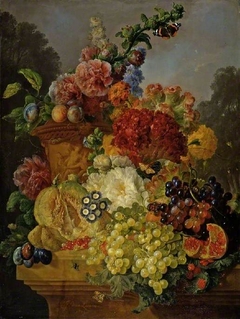 Flowers in an urn, with fruit by Gerrit Johan van Leeuwen