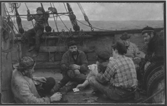 Sailors playing cards by Henry Scott Tuke