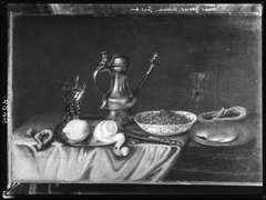 Still life with bread, nuts and lemons by Frans Ykens