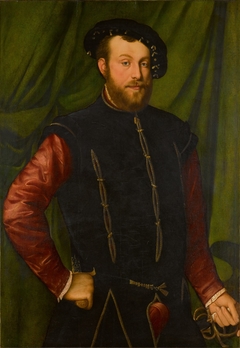 Portrait of a gentleman, three-quarter length, wearing a black cap and a black-slashed singlet over a red shirt by Palma Vecchio