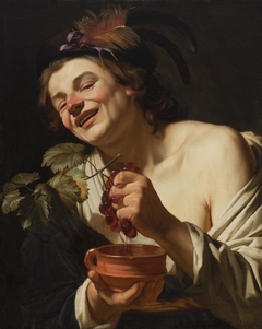 Smiling Young Man Squeezing Grapes by Gerard van Honthorst