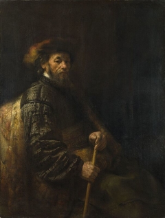 A Seated Man with a Stick by Rembrandt