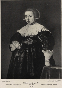 A Young Lady holding a Watch and a Chain in her Right Hand by Anonymous