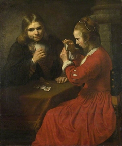 A Young Man and a Girl playing Cards by Anonymous