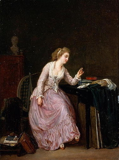 Jeune femme regardant une miniature by Marie Marc Antoine Bilcoq