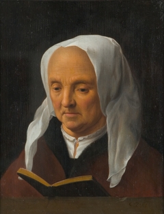 Old Woman Reading by Cornelius van Poelenburgh