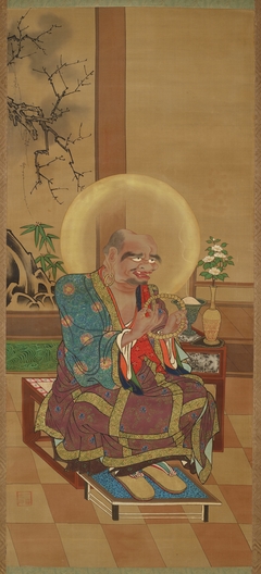 Seated arhat with rosary, one of a pair by Kanō Kazunobu