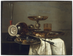 Still life with jug, tazza and fish by Cornelis Mahu