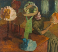 The Millinery Shop by Edgar Degas