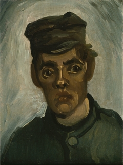 Head of a young peasant in a peaked cap by Vincent van Gogh